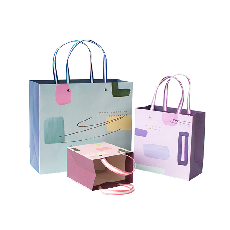 Wholesale Luxury Shopping Coated Paper Bags with Custom Logo Printed Recyclable Hand Length Handle for Gift Packaging