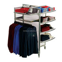 Étagères mobiles de gondole de magasin de vêtements pop moderne personnalisée magasin de vêtements au détail présentoir de t-shirts avec roue