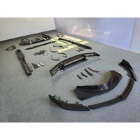 Kit carrosserie BUGE style PRO en fibre de carbone sèche : lèvre avant, diffuseur arrière, jupes latérales, ailerons arrière compatibles avec McLaren GT