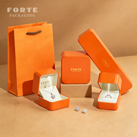 Boîte à bijoux en cuir brillant orange FORTE pour collier, bracelet, bague, boutique de détail, boîte à bijoux personnalisée avec lumière LED