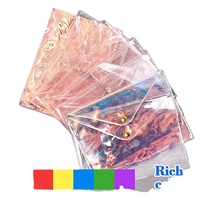 Voyage transparent personnalisé holographique PVC fermeture éclair enveloppe pochette cosmétique trousse de maquillage avec bouton pour les femmes