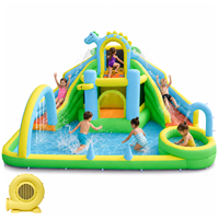 Château gonflable dinosaure avec double toboggan et piscine aquatique avec souffleur