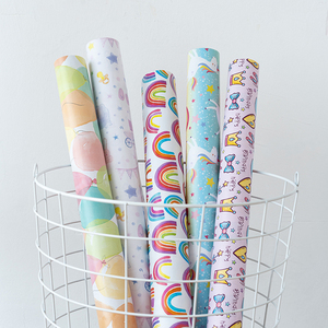 Venta al por mayor 80g Día Internacional del Niño papel tisú 43*300cm regalo lujo embalaje personalizado rollo de papel de regalo - Product Image 1