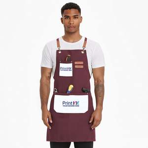 Delantal con espalda cruzada de tela vaquera de algodón Unisex con imagen personalizada y logotipo bordado, cintura de babero sin mangas personalizada para limpieza, refrigeración con bolsillos - Product Image 1