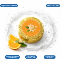 Tablette de douche effervescente OEM ODM à la mandarine 30g, personnalisable avec marque privée, pour un ensemble cadeau spa apaisant et relaxant