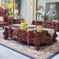 Table basse de salon en bois d'acajou de style américain d'inspiration antique, sculptée à la main, avec plateau en verre