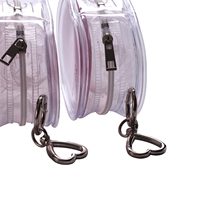 Pochette cosmétique mini ovale en PVC transparent tendance avec logo personnalisé, doublure imperméable en forme de cœur, pochette de rangement portable pour éponge à maquillage