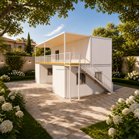 Villa moderne à deux étages en conteneur blanc préfabriqué avec balcon et cour double face pour hôtel de montagne, gîte ou bureau