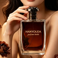 Vente en gros de flacons de parfum rectangulaires HANYOUDA de 100 ml, bouchon en métal doré, verre cristallin épaissi, pulvérisateur à pompe, gravure dorée