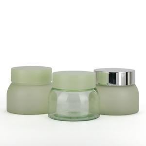 Venta al por mayor de fábrica: Tarros cosméticos de plástico de lujo, color verde personalizado, boca ancha, tapa de rosca para crema de ojos, loción y limpiador facial. - Product Image 1