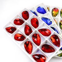 Dongzhou Vente en gros de cristaux Accessoires de couture Forme de goutte d'eau Strass à dos plat pour vêtements et chaussures Perles de pierre de cristal