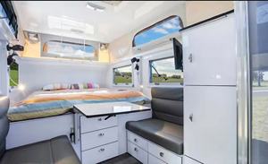 Espaciosa Autocaravana Impermeable con Cocina Integrada de Acero Inoxidable y Diseño Multipersonal para Acampadas Prolongadas - Product Image 4