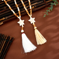 Collier ethnique bohème en gros avec perles en bois, pampille étoile, pendentif turquoise synthétique, longue chaîne, cadeau pour femme, bijoux d'été pour la plage