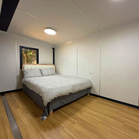 Maison conteneur modulaire de luxe extensible de 20 pieds en panneaux sandwich, mini-maison préfabriquée, cabane portable, appartement, salon, cuisine, salle de sport