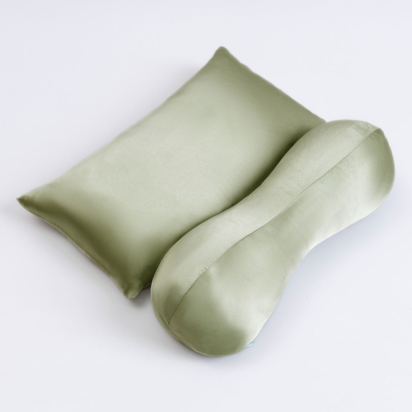 หมอนผ้าไหมสีเขียวสำหรับดึงคอ