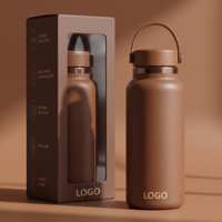 Bouteille isotherme personnalisable de 32 oz, sans BPA, compatible lave-vaisselle, en acier inoxydable, portable, avec base en silicone.
