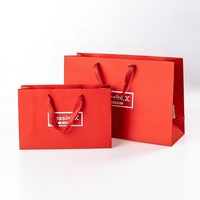Élégant sac en papier à provisions en ruban robuste personnalisable sac à vêtements moderne à poignée plate pour chaussures sac cadeau enduit