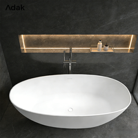 Baignoire Adak personnalisable en surface solide, moderne, autoportante, pour immersion, finition mate/brillante, pour appartement/villa, avec drain