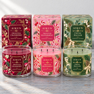 Fábrica Aikun suministra velas navideñas perfumadas de tres mechas con cajas de regalo impresas para venta al por menor, con empaques personalizados decorativos. - Product Image 1
