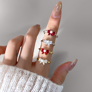 Bague ajustable en forme de nœud papillon avec perle centrale et zircon cubique en forme de cœur, pour femme, vente en gros - Product Image 1