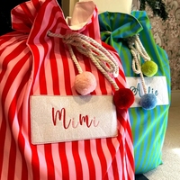 Toile à rayures rouge rose vert bleu avec pompon ficelle de coton doux sacs de père noël personnalisés vierges