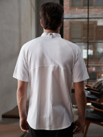 Veste de chef unisexe moderne, coupe ajustée, panneaux en maille ventilée, surpiqûres contrastées, légère, manches courtes, polyester/coton, restaurant
