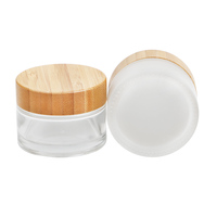 Vente en gros biodégradable Emballage cosmétique cylindrique de 30g 50g Pot de crème pour soin de la peau Bocaux en verre dépoli avec couvercles en bambou