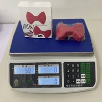 Offre Spéciale 2 pièces couleur personnalisée maniques en silicone Bowknot en forme de pot résistant à la chaleur pinces pour la cuisine