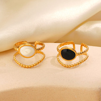 Bague cercle creux lignes plaquées or Bagues elliptiques en pierres précieuses gouttelettes d'huile Bijoux en acier inoxydable de luxe noir et blanc