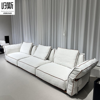 Canapé modulaire en tissu style crème, entièrement déhoussable, mousse haute densité, idéal pour les zones de réception familiales modernes et minimalistes