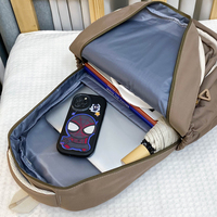 Sac à dos scolaire multifonctionnel en nylon 2025, imperméable, pour garçons et filles, avec port USB et fermeture éclair tendance – Vente directe usine