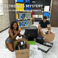 Boîte mystère électronique en stock : gadgets technologiques et intelligents variés, boîte mystère noire pour les magasins de cadeaux avec service OEM