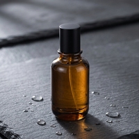 Vente en gros de flacons de parfum en verre de marque luxueuse, flacon de parfum rond en ambre, flacon de parfum personnalisé avec boîte de luxe