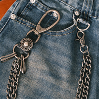 Ceinture chaîne gothique à breloques os et dés pour jeans, avec maillons doubles drapés et finition argent antique – Grande Vente