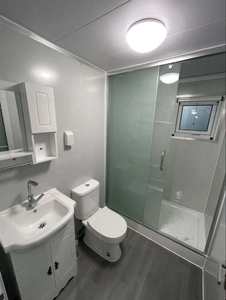 Maisons préfabriquées multifonctionnelles extensibles, logement moderne, mini-maison préfabriquée de 20 pieds, texture bois premium pour location de <span class=keywords><strong>vacances</strong></span> - Product Image 5