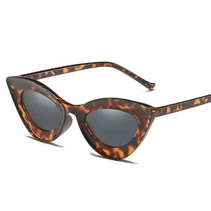 Kleine Rahmen schwarze Katzenauge Sonnenbrille für Damen Europa und die Vereinigten Staaten von Amerika Mode Straßenfotografie konkave Form Sonnenbrille