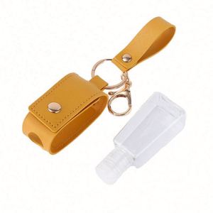 Wholesale Cute <b>Mini</b> Portable 30ml Travel <b>Spray</b> <b>Bottle</b> UV Sanitizing Multifunction Promotional Neoprene Hand Holder Keychain Silk - Product Image 1