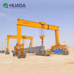 رافعة جسرية ديزل 90 طن بإطارات مطاطية مع وحدة تحكم منطقية قابلة للبرمجة وصندوق تروس للرفع المستقر في مراكز الخدمات اللوجستية - Product Image 3