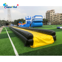 Toboggan aquatique gonflable géant commercial Slip N Pool en liquidation à vendre
