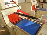 Machine d'emballage sous film rétractable automatique à barre en L pour bouteilles/boîtes