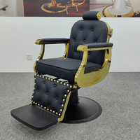 Chaise de salon de coiffure de luxe classique de style antique en cuir noir avec cadre doré et base ronde de haute qualité