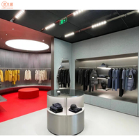 Nouvelle boutique Vitrine de vêtements Design personnalisé Table vitrine en acier inoxydable pour magasin de vêtements
