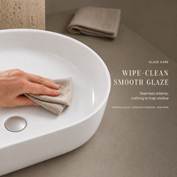 Lavabo ovale en céramique 50x38cm à poser, blanc brillant, moderne, résistant à l'eau, rebord fin, trou unique pour robinet