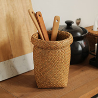 Panier de rangement rustique multi-usages en herbe de jonc naturelle tressée à la main, écologique, avec poignée en cuir, plusieurs tailles, vente en gros