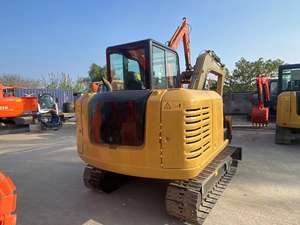 Mini-excavatrice 303.5 d'occasion (90% neuve), modèle 2022, poids opérationnel de 3 tonnes, capacité de la benne de 0,05 m³, moteur, boîte de vitesses, pompe - Product Image 2