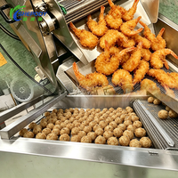 Chaîne de production de friture continue Shepody certifiée CE pour produits à base de pâte (Bakso Goreng, gâteaux de poisson, Tater Tots, Coxinha) – Capacité 100 kg/h