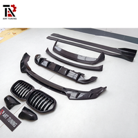 Kit carrosserie en fibre de carbone pour BMW X1 F48 LCI : Lame avant, jupes latérales, diffuseur arrière, spoiler de toit, calandre, coques de rétroviseurs, spoiler arrière