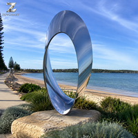 Sculpture en acier inoxydable poli miroir, motif galet, polie à la main, art abstrait pour la décoration extérieure des places publiques, jardins, entrées d'hôtels et aménagements paysagers