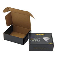 Boîtes d'expédition personnalisées pour ampoules LED, en carton ondulé recyclé, finition mate noire, pour appareils électroménagers, emballage moderne et luxueux.