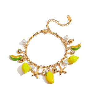 Bracelet à breloques fruits en alliage de zinc plaqué or avec perles, citron et étoile de mer – Bijoux pour femme - Product Image 1